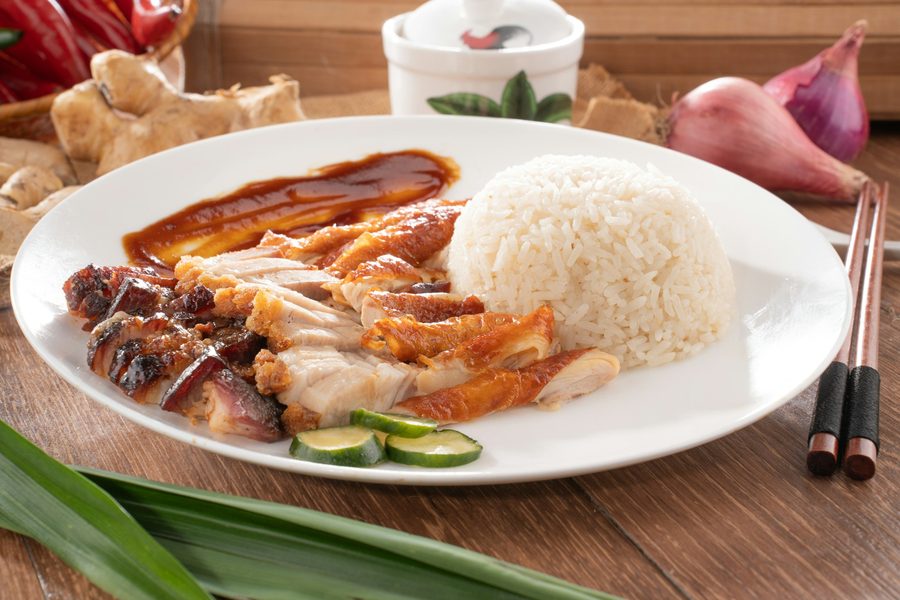 A plate of roast duck and char siu rice being scanned